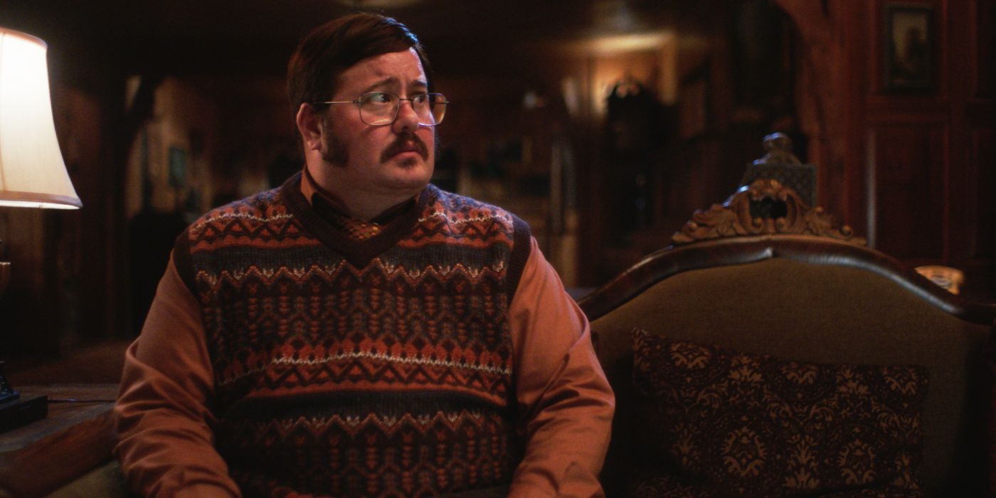 Still of Chaz Bono on a couch looking concerned in Little Bites