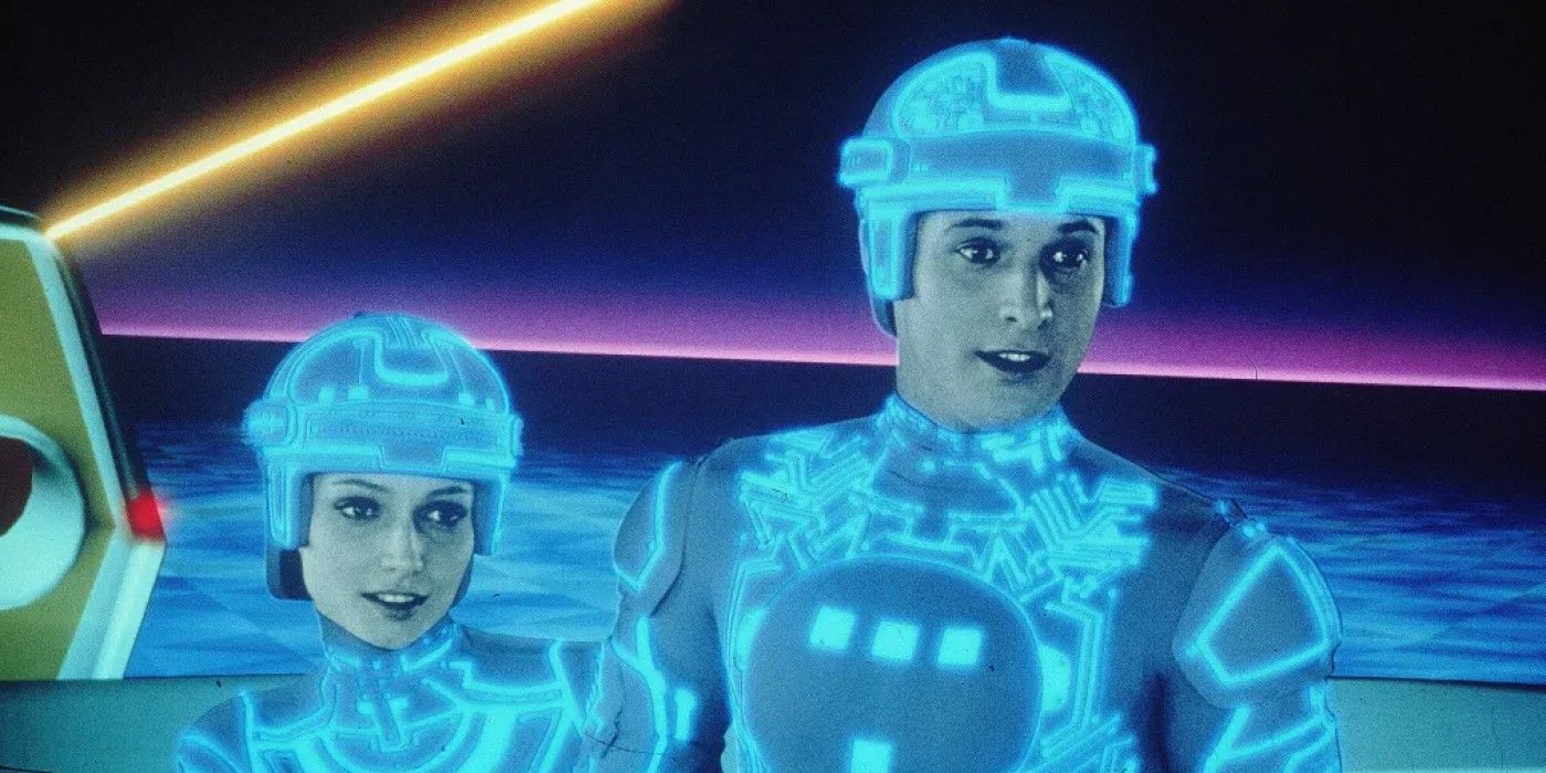 Lora (Cindy Morgan) and Alan Bradley (Bruce Boxleitner) standing together in 1982's 'Tron'