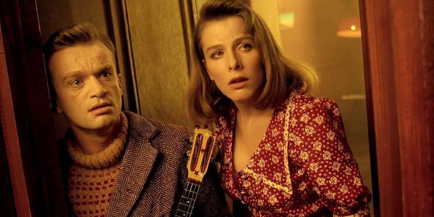 Louison (Dominique Pinon) and  Mademoiselle Plusse (Karin Viard) in Delicatessen