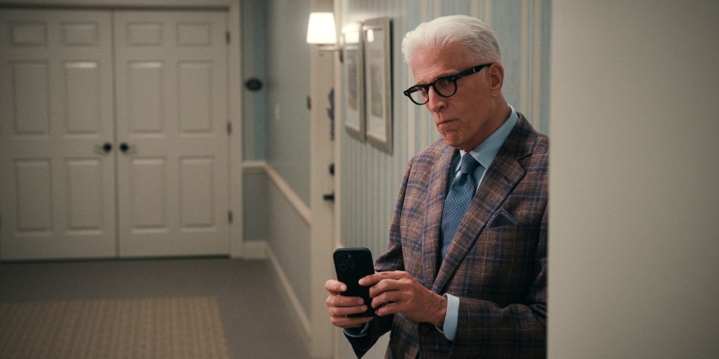 Ted Danson uses his phone to snoop around a corner in 'A Man on the Inside'