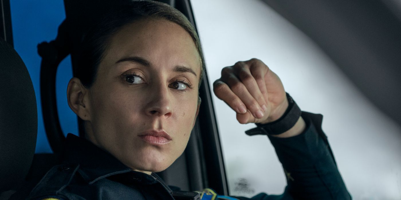 troian bellisario as police officer Traci Harmon sitting in her police cruiser in 'On Call'