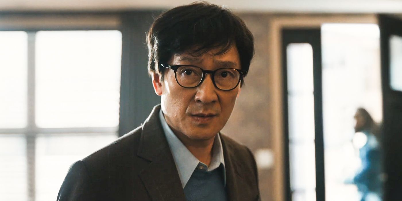 Ke Huy Quan as Marvin Gable in glasses and looking serious in Love Hurts