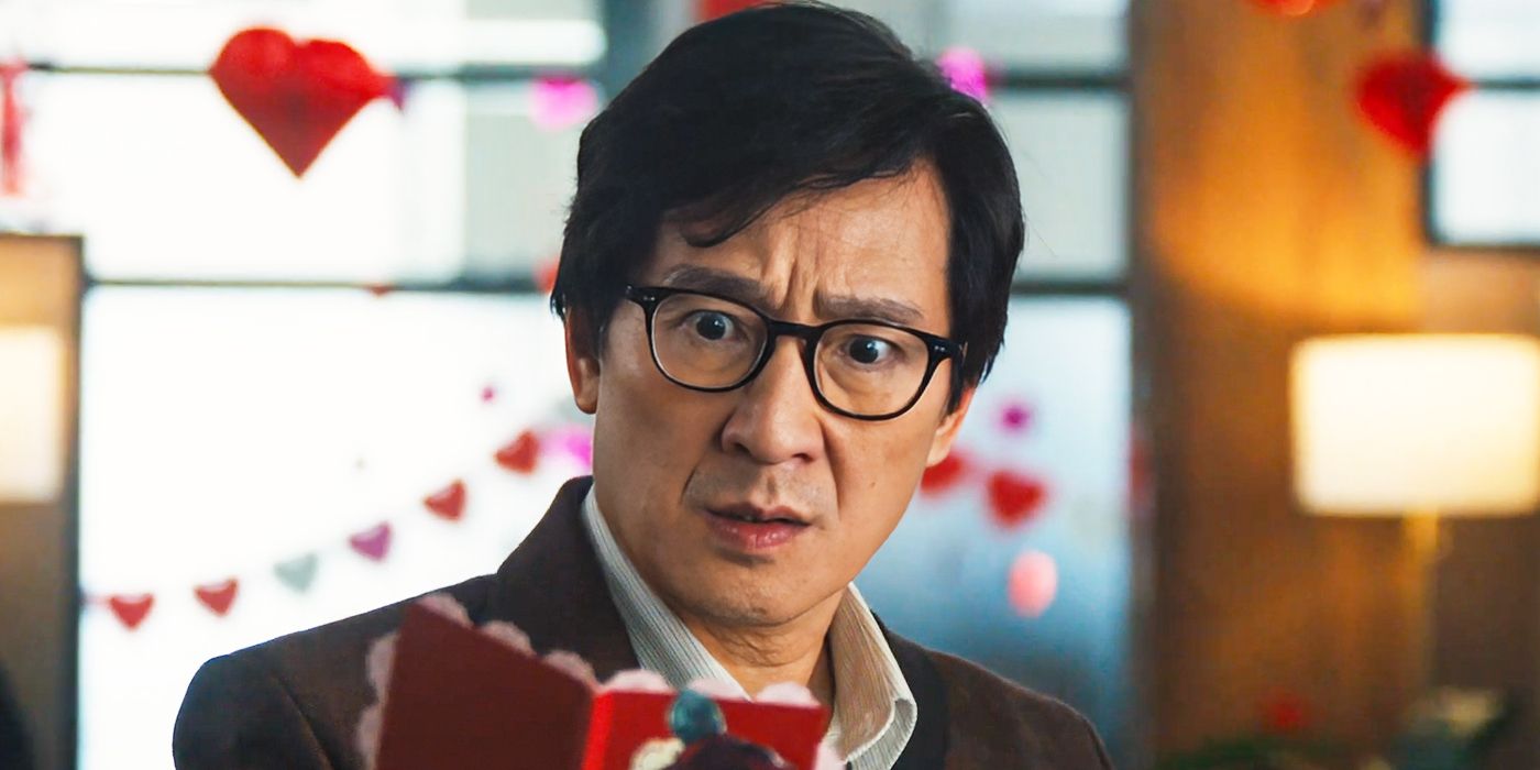 Ke Huy Quan as Marvin Gable looking surprised while reading an unexpected Valentine in Love Hurts