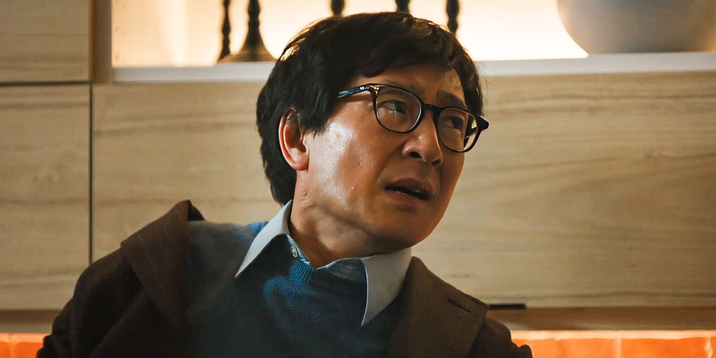 Ke Huy Quan as Marvin Gable in glasses and looking to the left in Love Hurts