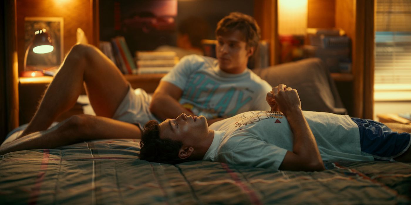 Cooper Koch as Erik Menendez lying on the bed with Lyle Menendez (Nicholas Alexander Chavez) in Monsters.