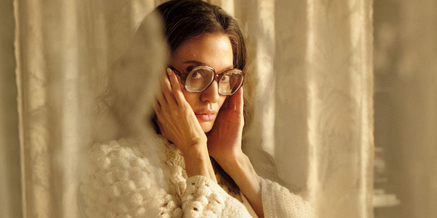 Angelina Jolie wearing glasses in Maria