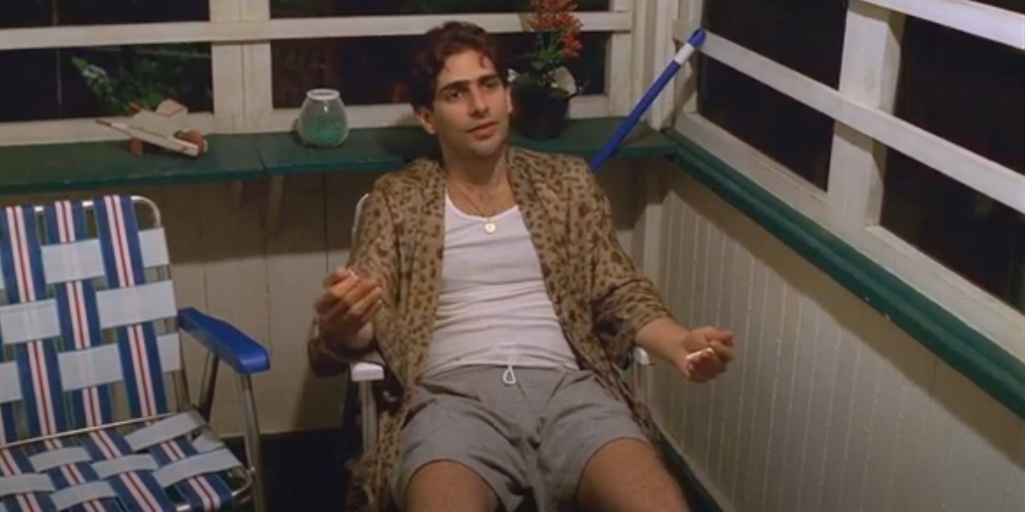 Michael Imperioli as Christopher Moltisanti sitting in a lawn chair in The Sopranos