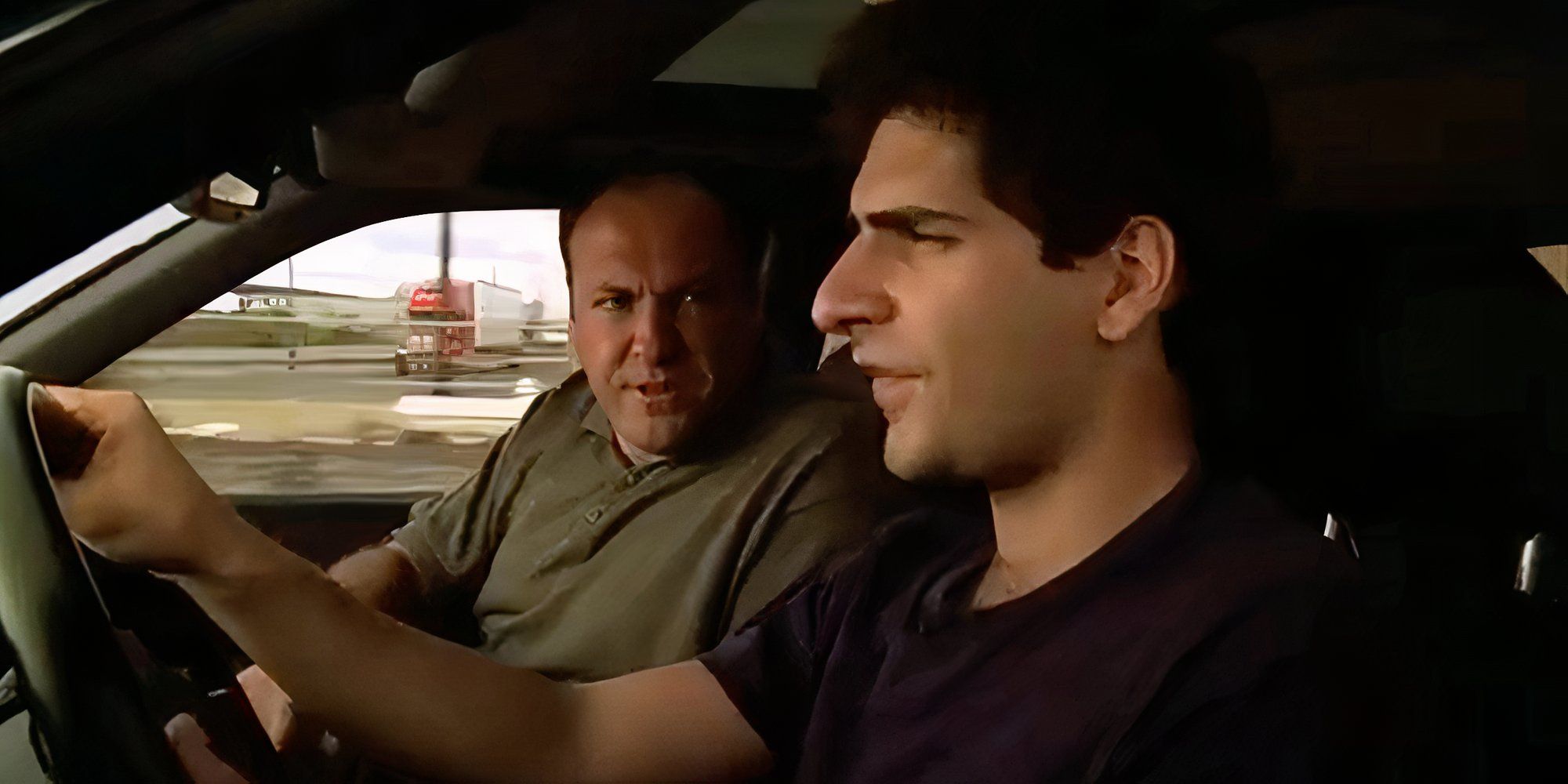 Michael Imperioli driving while James Gandolfini is looking at him from the passenger&rsquo;s seat in The Sopranos