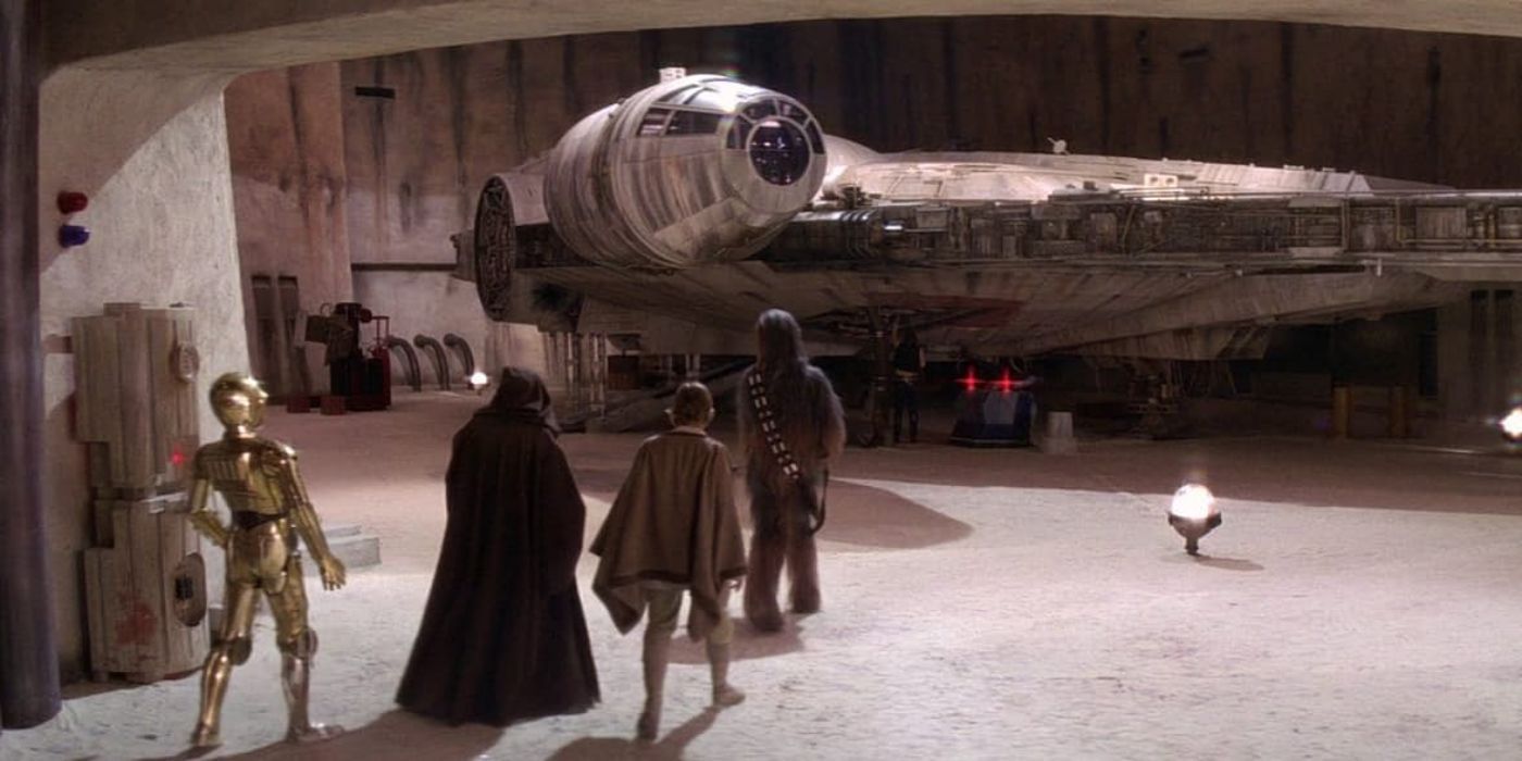 Luke (Mark Hamill), Obi-Wan (Alec Guinness), C3PO (Anthony Daniels), and Chewbacca (Peter Mayhew) walking towards the Millennium Falcon in Star Wars: A New Hope