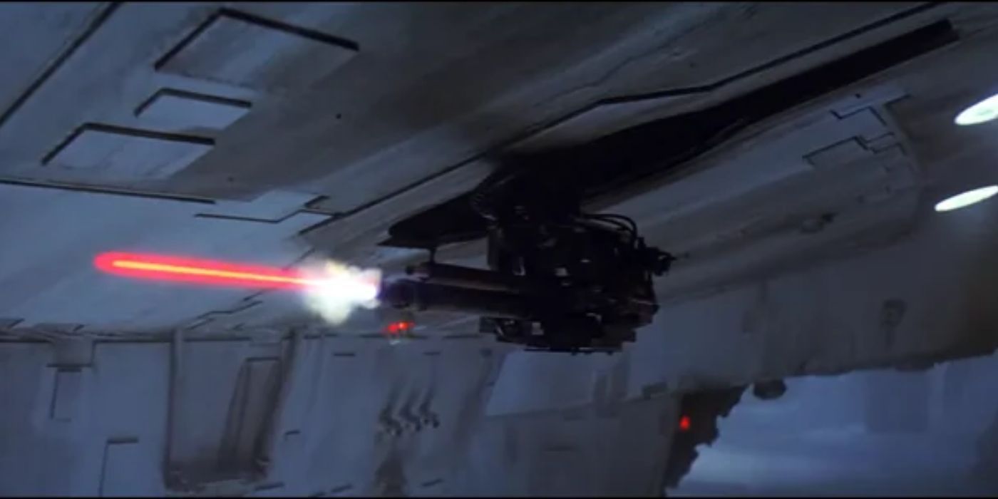 Sentry gun shooting a laser on the bottom of the Millennium Falcon in Star Wars