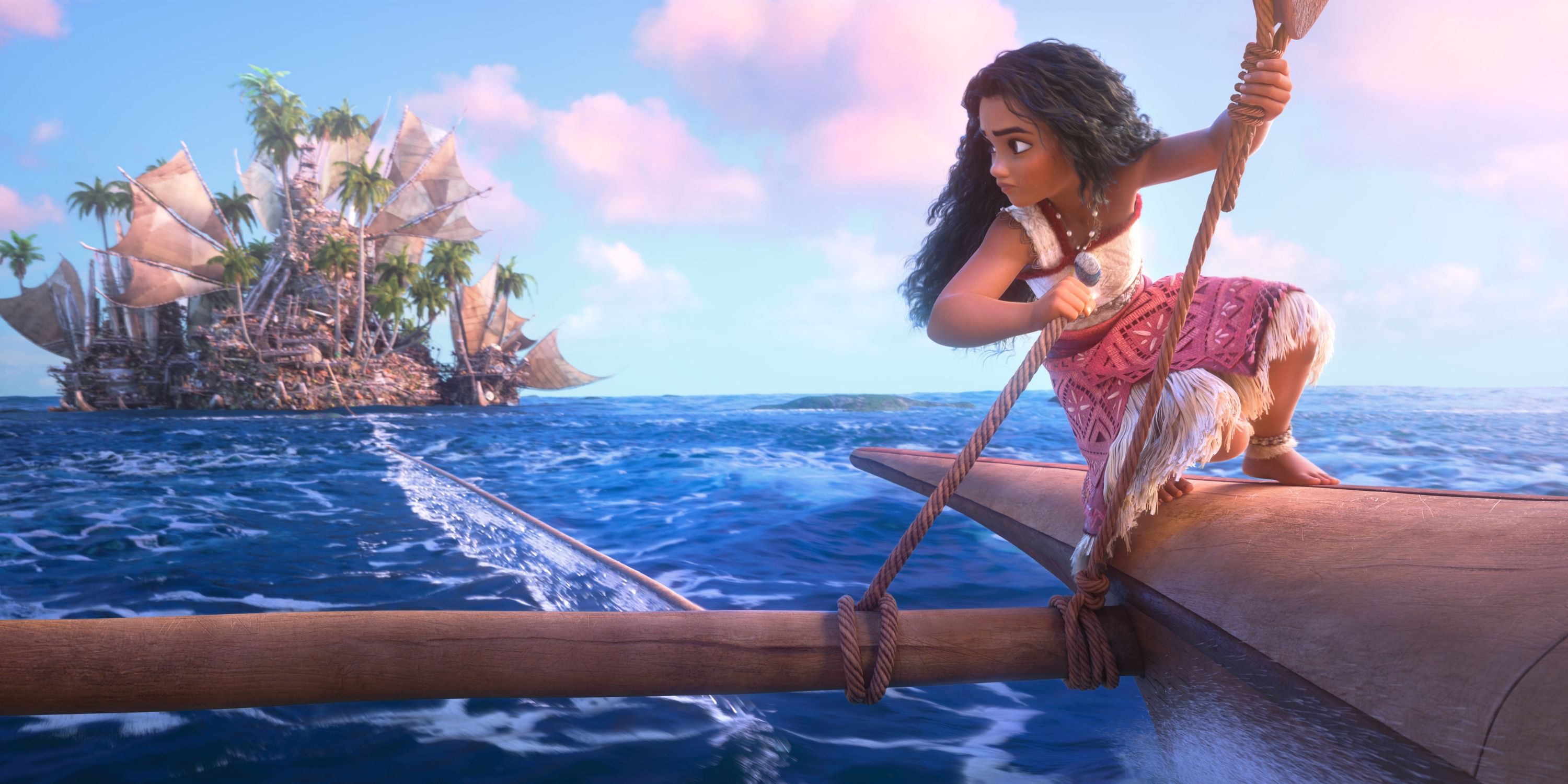 Moana (Auli&rsquo;i Cravalho) setting out on the ocean while hanging from her ship in Moana 2