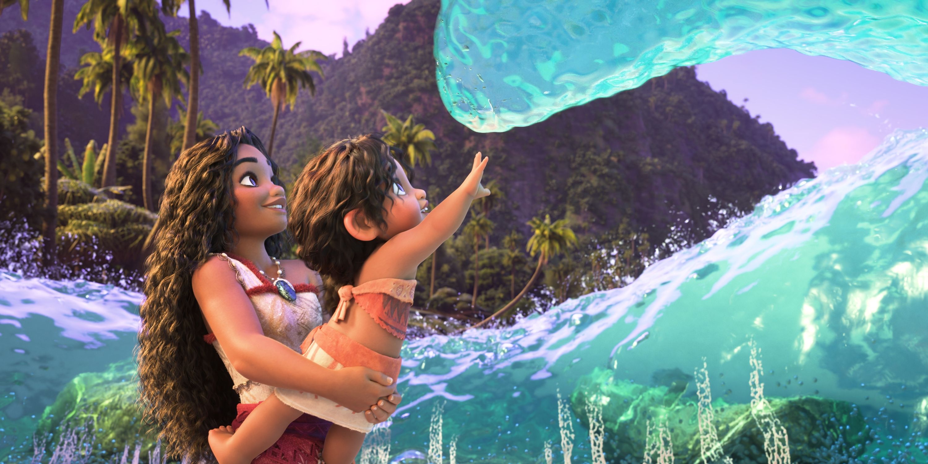 Moana (Auli'i Cravalho) with her younger sister Simea while holding her up to touch the water in Moana 2