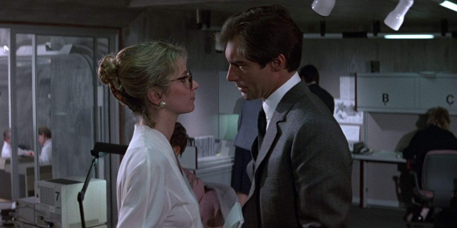 Moneypenny (Caroline Bliss) and Bond (Timothy Dalton) in 'The Living Daylights'