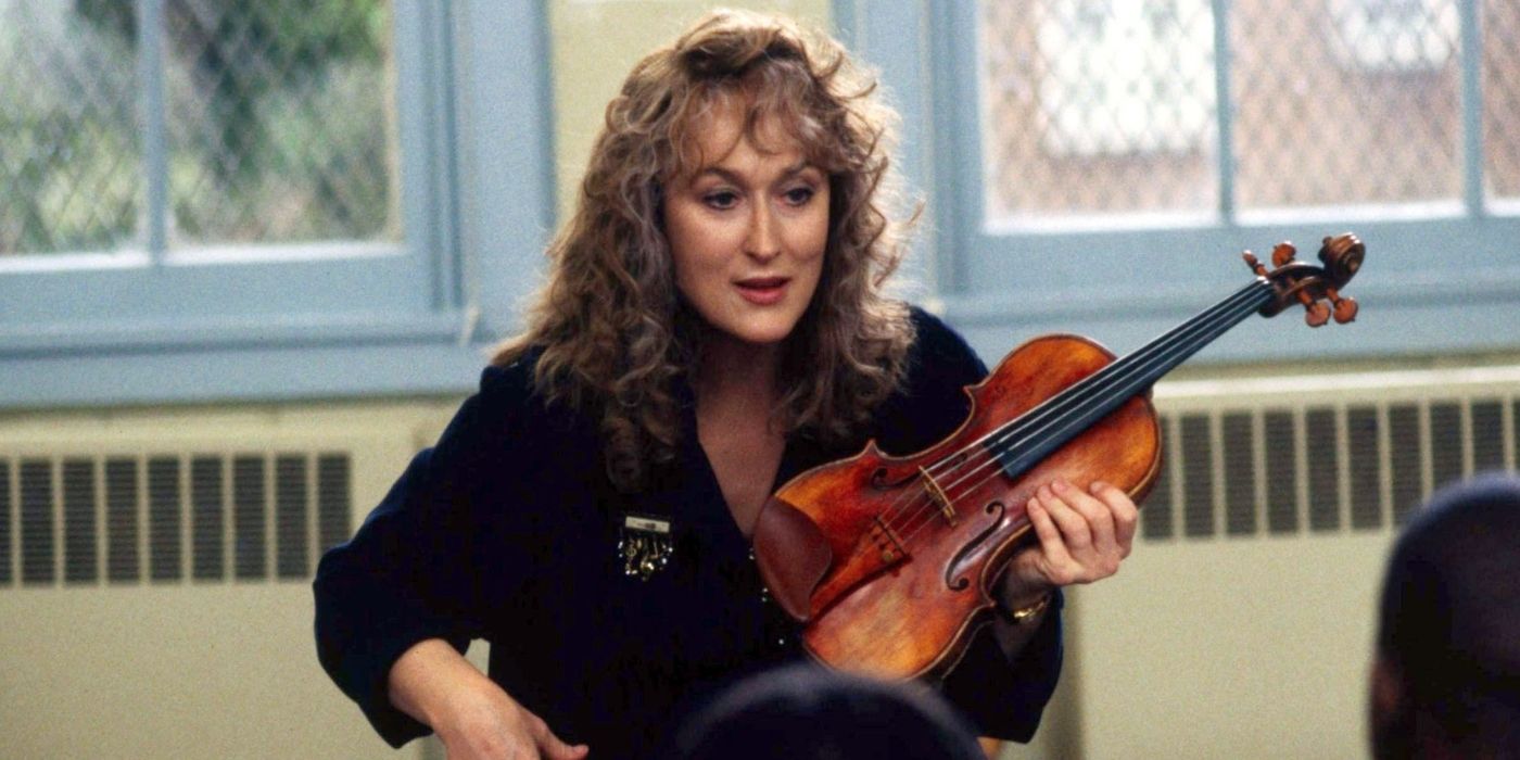 Meryl Streep's Roberta teaching violin to students in Music of the Heart.