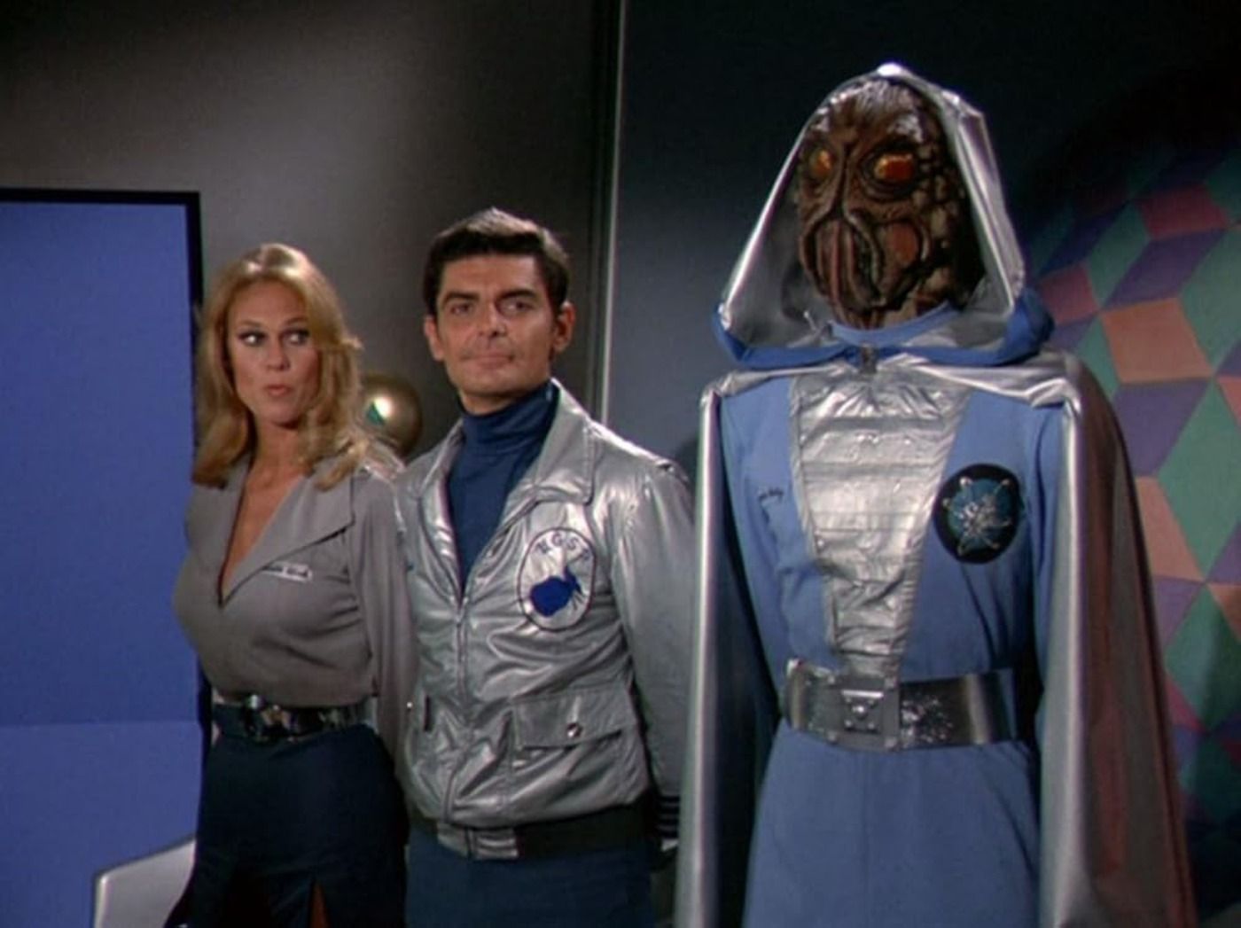 Two humans and an alien