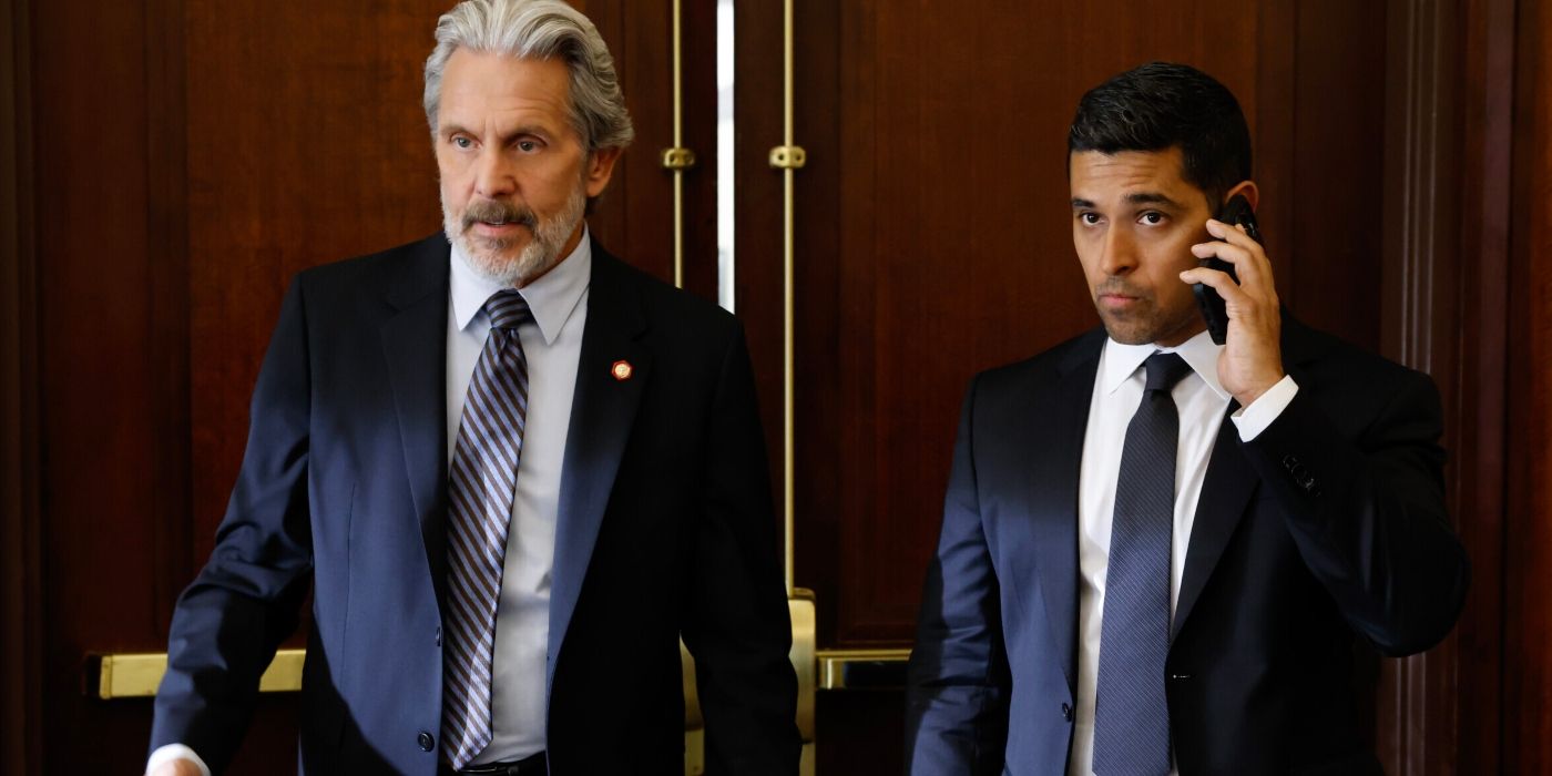 Alden Parker (Gary Cole) and Nick Torres (Wilmer Valderrama) wearing navy suits and ties in NCIS