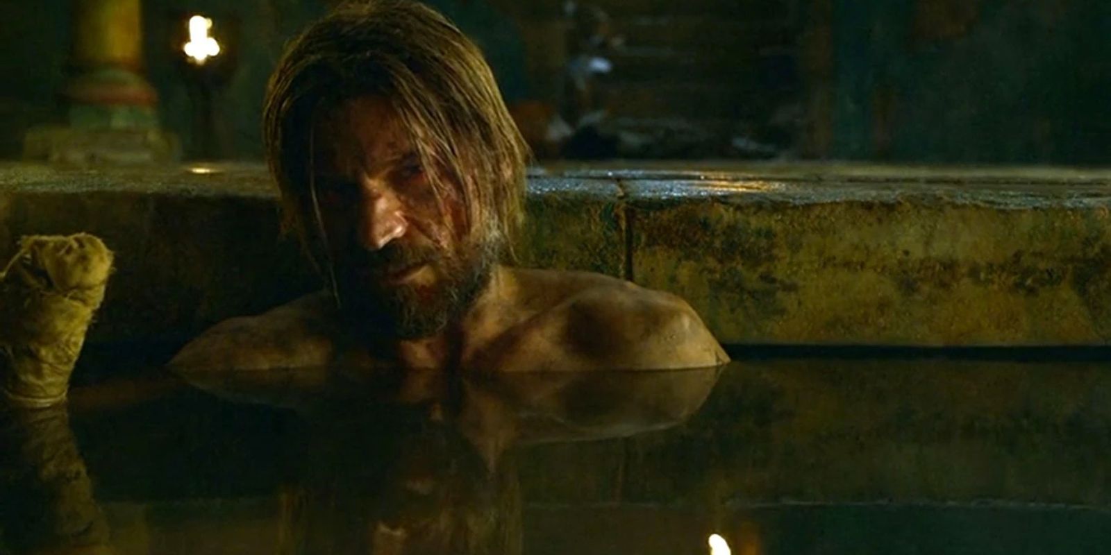 Jaime Lannister looking distressed while taking a bath in Game of Thrones