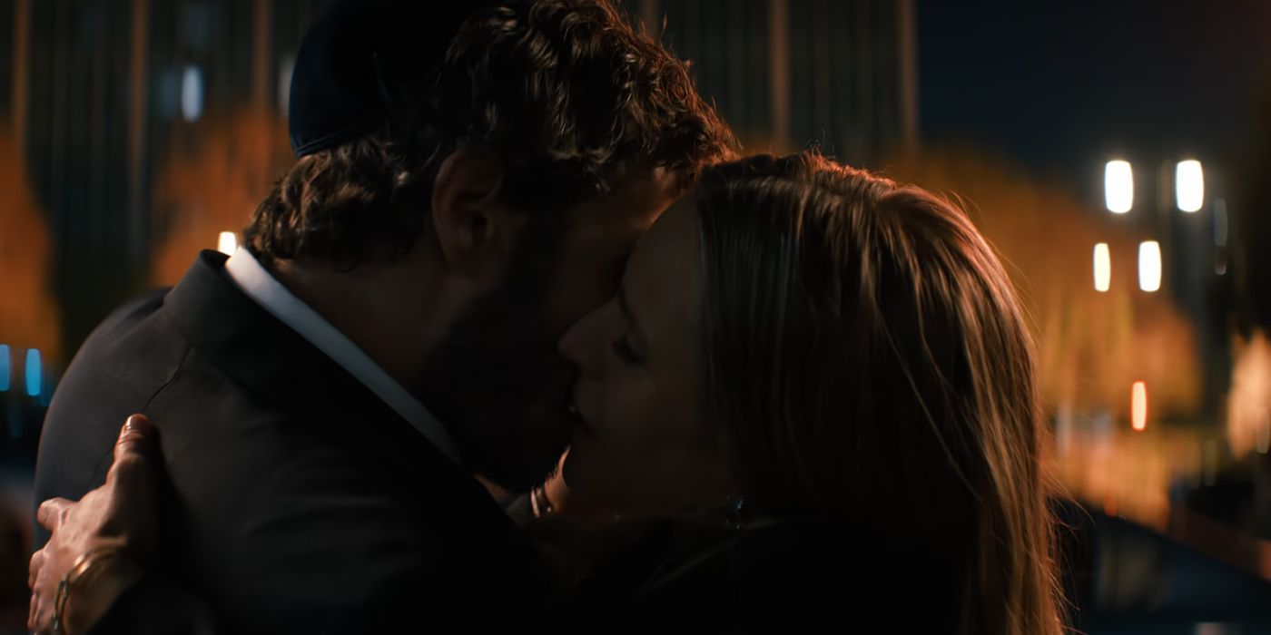 Noah (Adam Brody) and Joanne (Kristen Bell) share a passionate kiss in the Nobody Wants This Season 1 finale