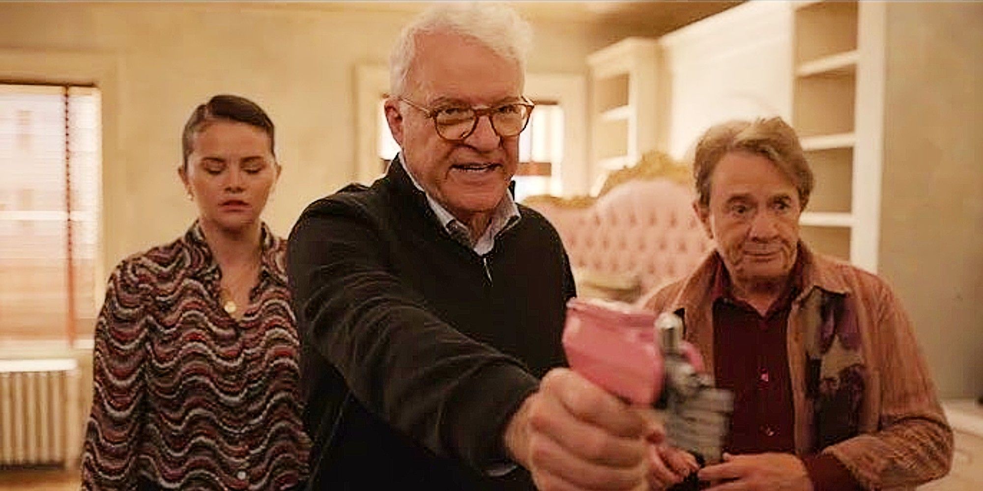 Charles protecting Mabel and Oliver with a multitool in Only Murders in the Building Season 4, Episode 10.
