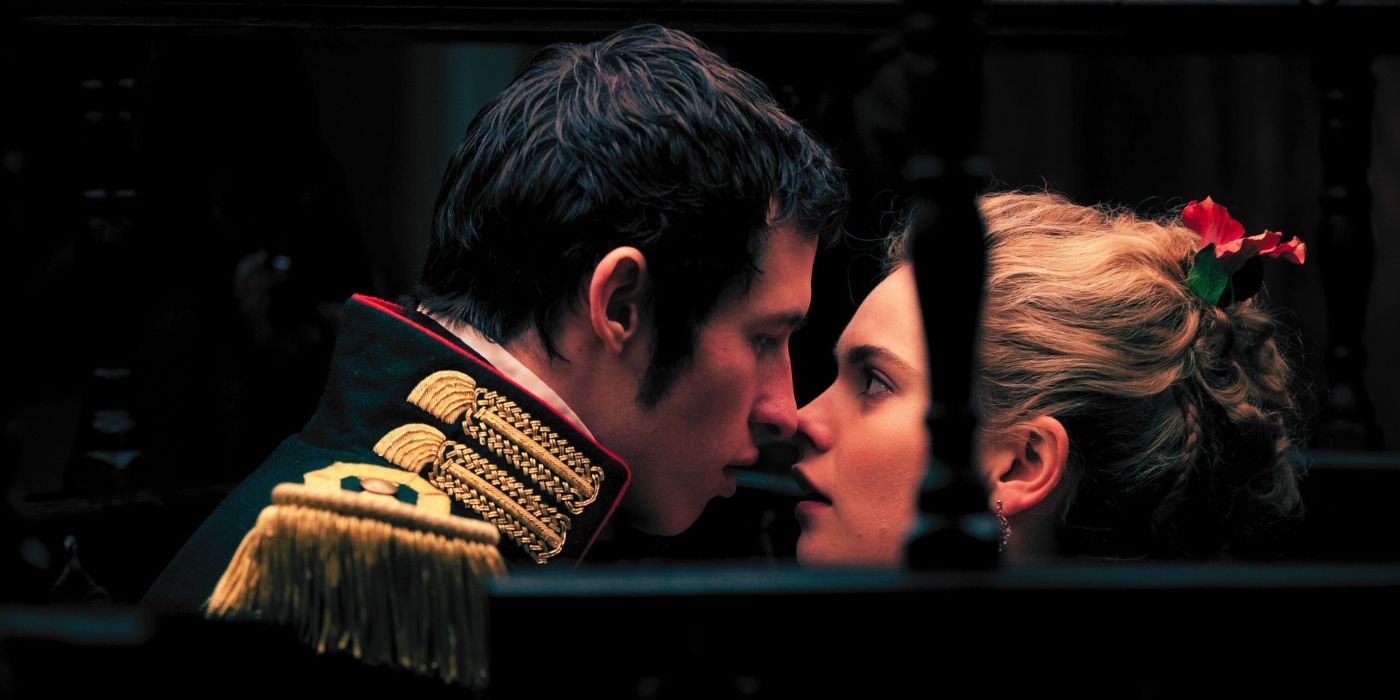 Anatole Kuragin (Callum Turner) almost kisses Natasha Rostova (Lily James) in 'War & Peace.'