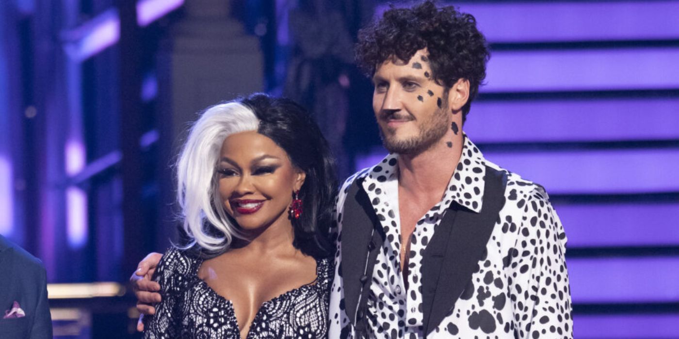 Phaedra Parks standing next to Val Chmerkovskiy in DWTS's Disney Night.