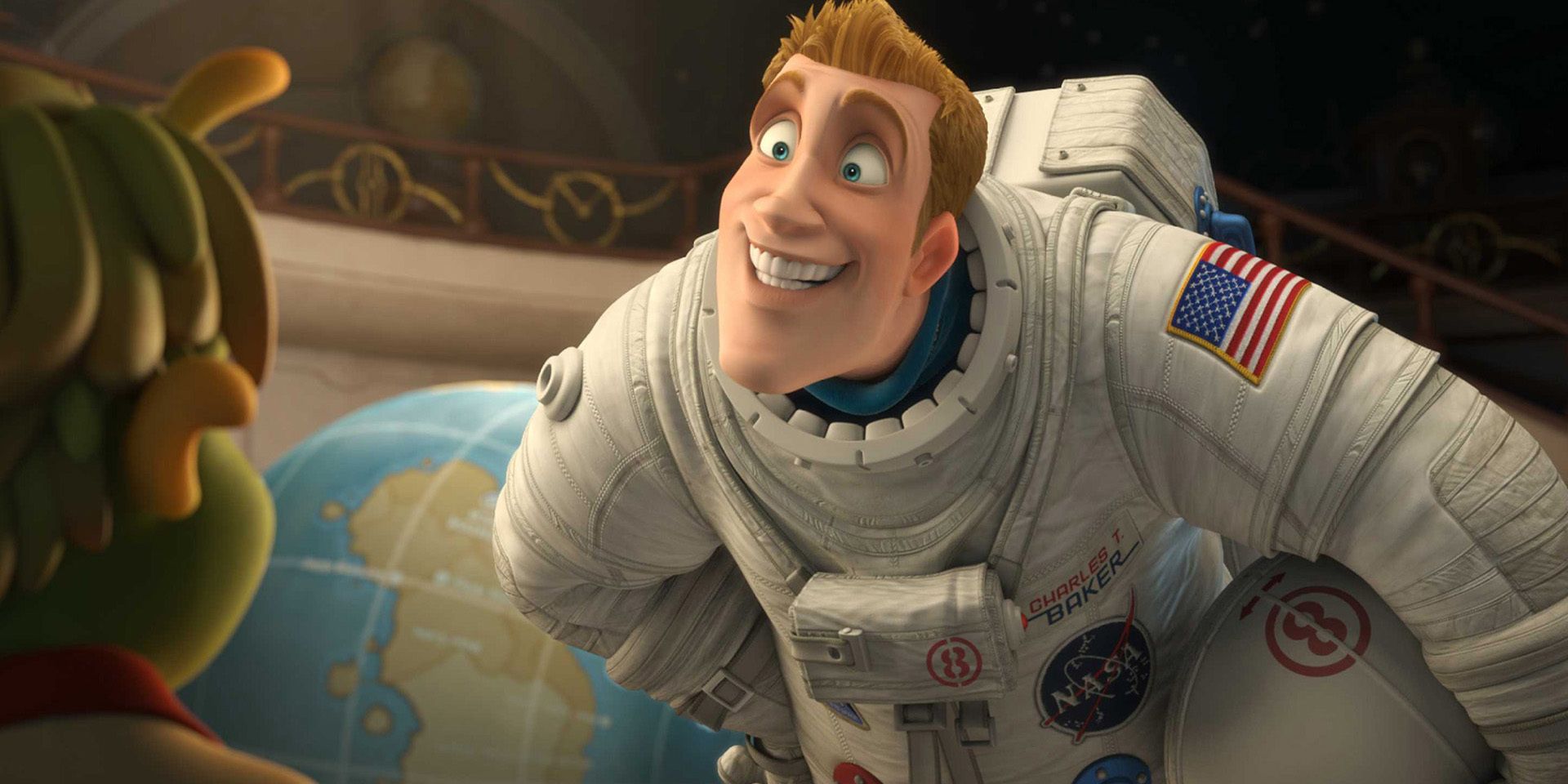 An astronaut smiling and looking down at a green alien in 'Planet 51'