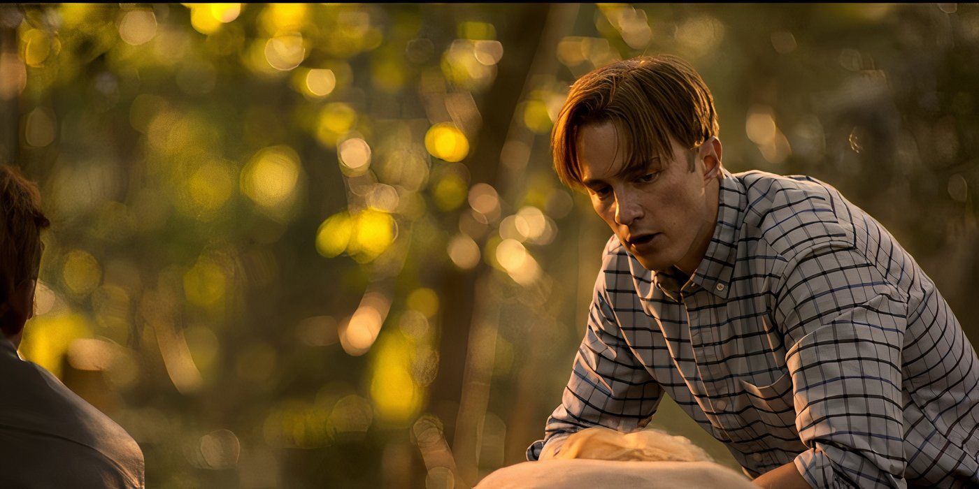 Drew Starkey as Rafe Cameron at the grave site of Cecilia Tanny in Outer Banks.