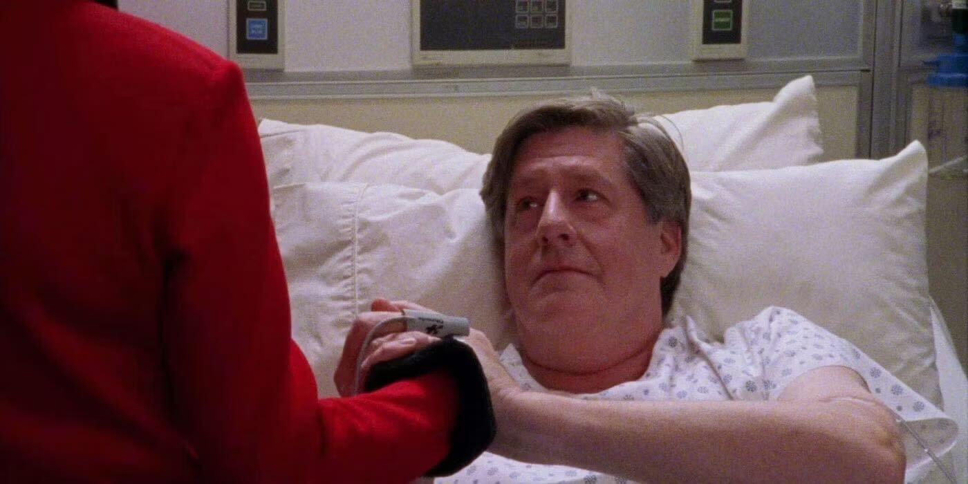 Richard Gilmore holding Emily Gilmore&rsquo;s hand and looking at her tenderly in Gilmore Girls