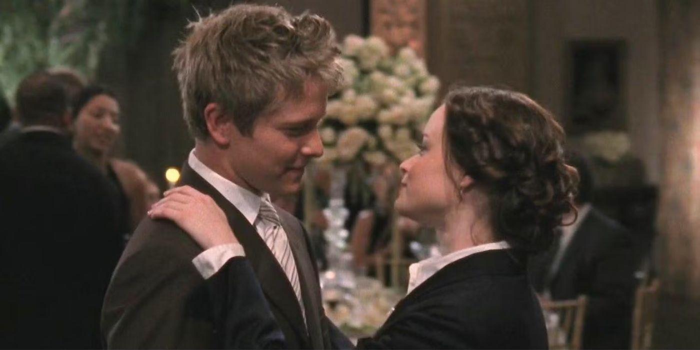 Alexis Bledel and Matt Czuchry as Rory and Logan dancing together in Gilmore Girls.