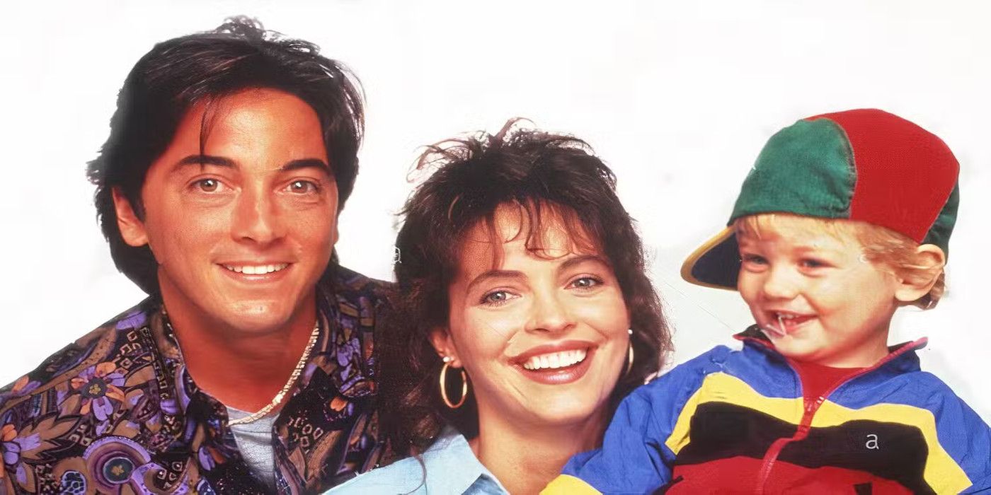 Scott Baio and Mary Page Keller pose with baby Mikey for the television series, &lsquo;Baby Talk.'