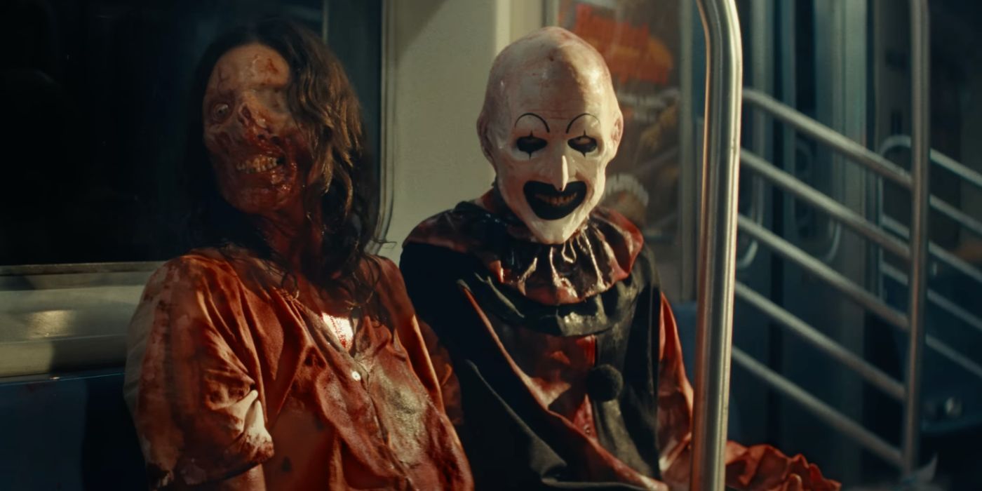 Vicky, played by actor Samantha Scaffidi, and Art the Clown, played by actor David Howard Thornton, ride a train in Terrifier 3.