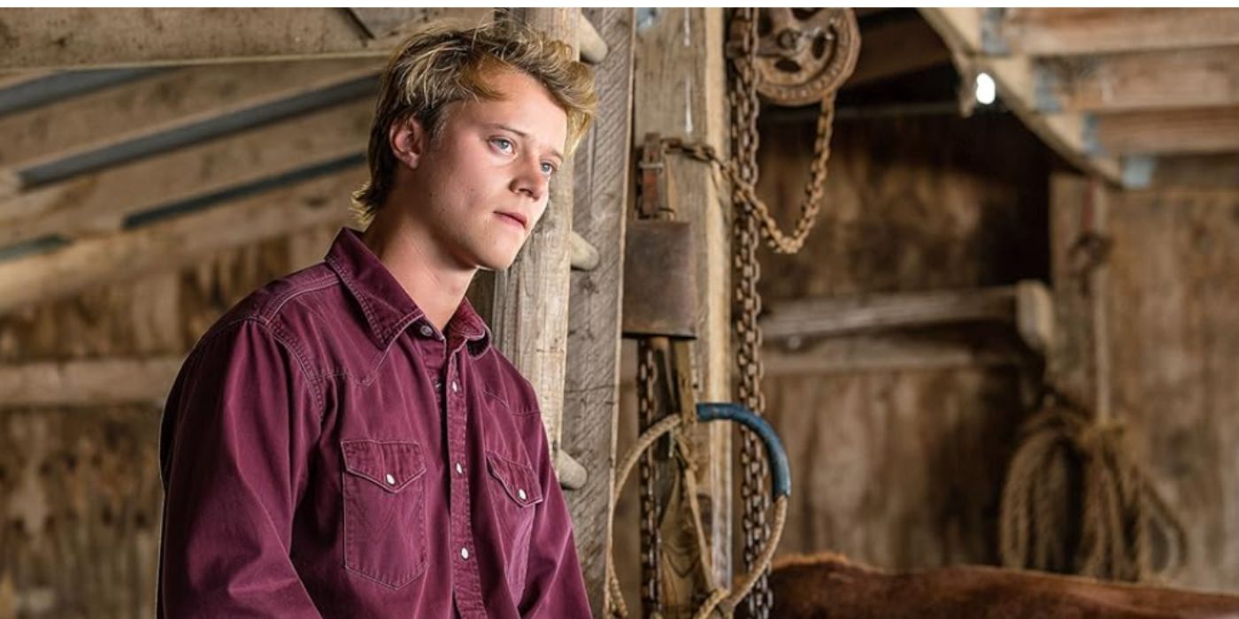 Rudy Pankow as Erwin wearing a purple shirt in a ranch in 'Accidental Texan'