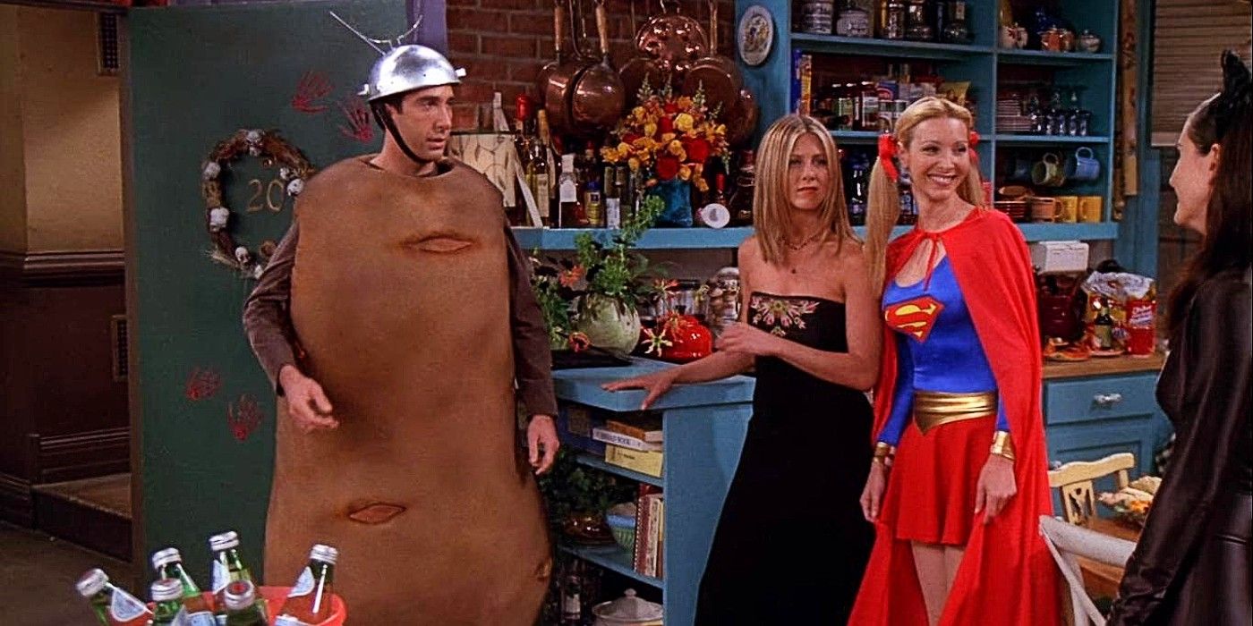 Ross as Spudnik, Rachel in a nice dress, Phoebe as Superwoman, and Monica as a cat for Halloween in Friends