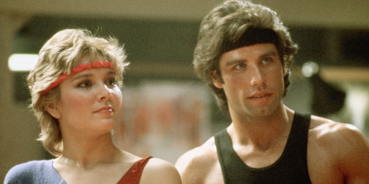 John Travolta&rsquo;s Tony standing with Cynthia Rhodes' Jackie in Staying Alive