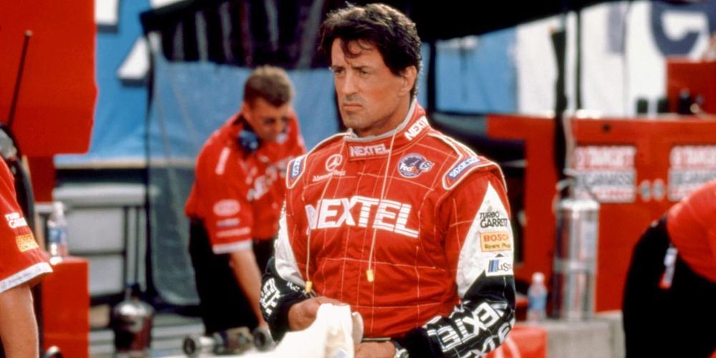 Sylvester Stallone next to his race car in 'Driven' (2001)