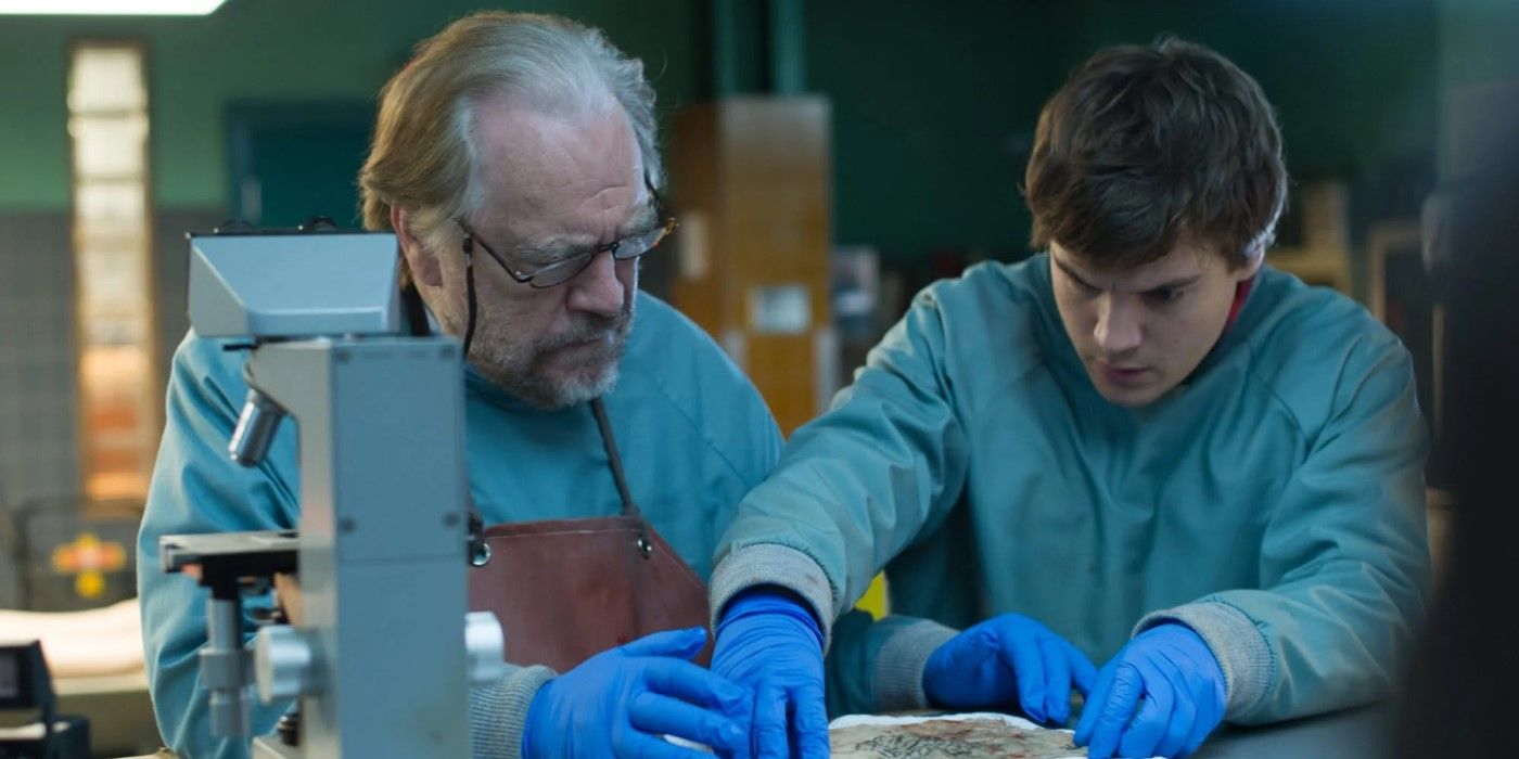 Brian Cox and Emile Hirsch by a microscope in The Autopsy of Jane Doe.