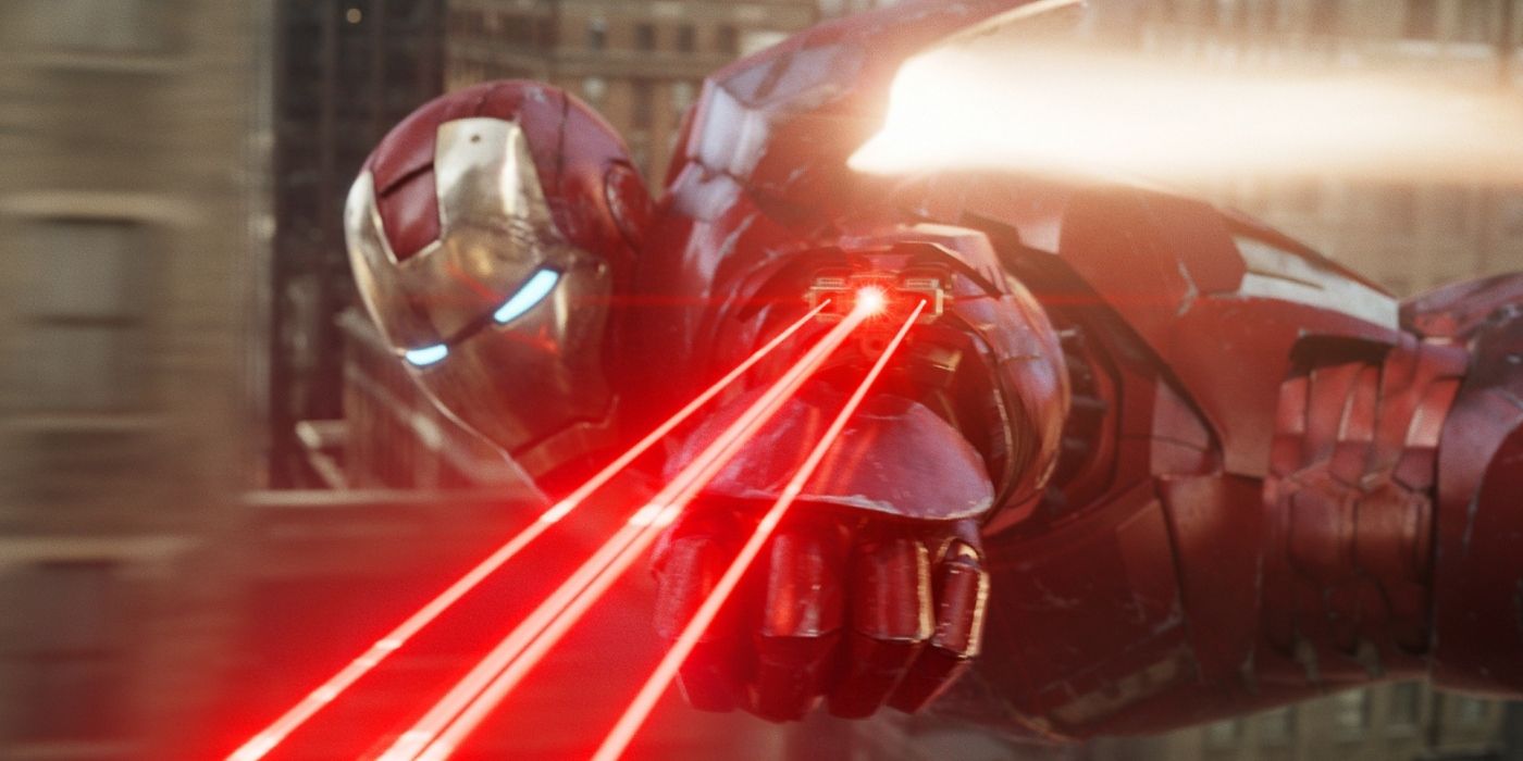 Iron Man flying with red lasers shooting out of his mechanical glove in The Avengers