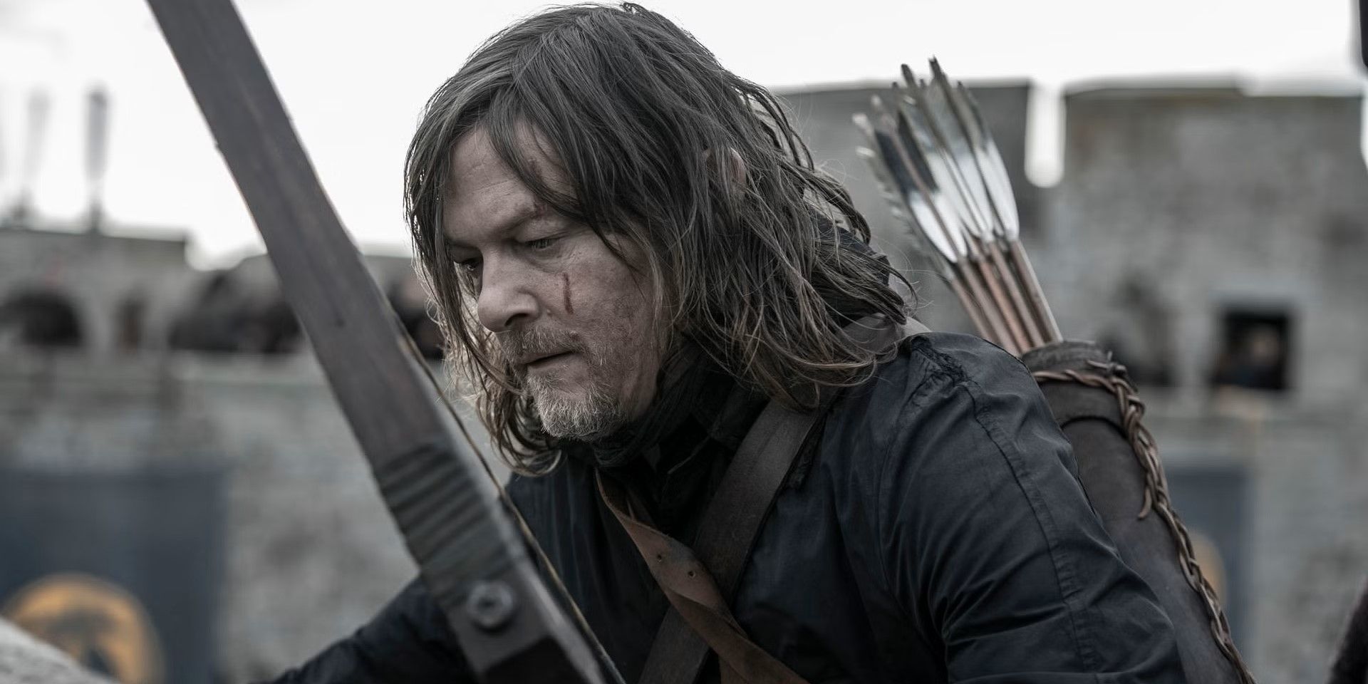 Daryl holds his crossbow in 'The Walking Dead: Daryl Dixon - The Book of Carol' episode "L'Invisible"