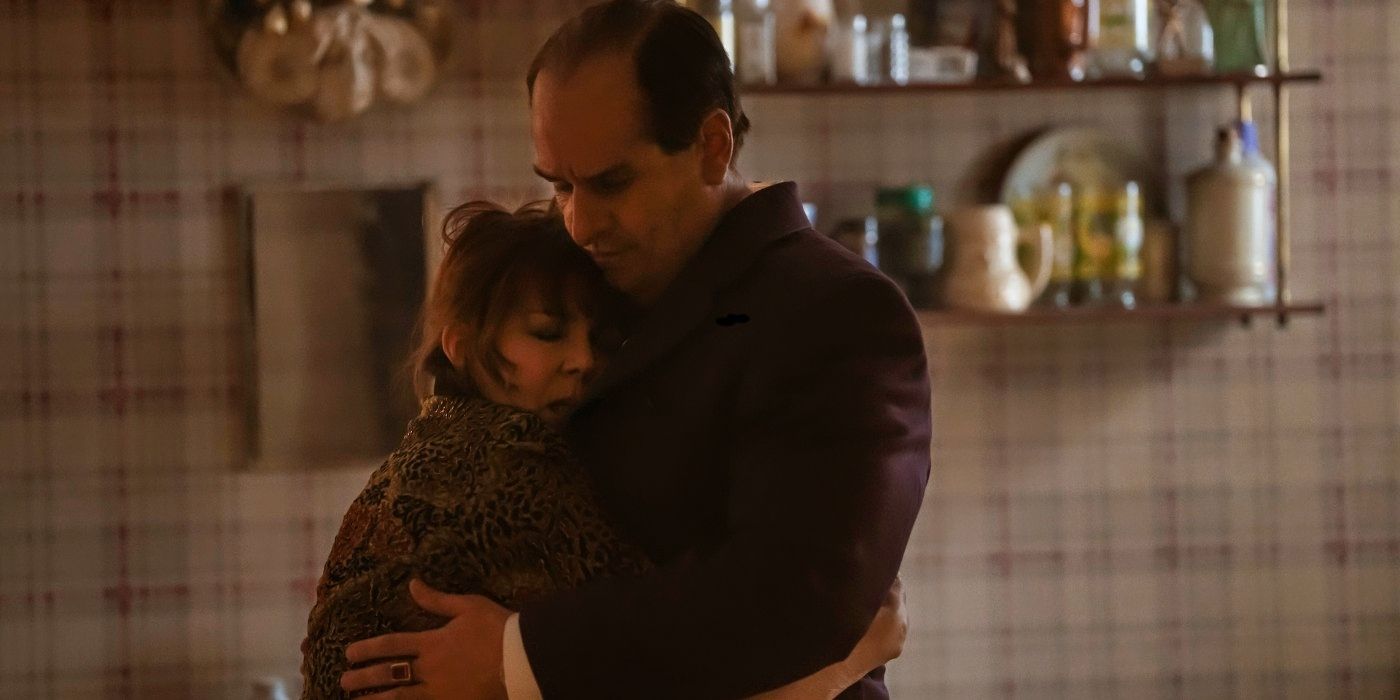 Colin Farrell as Oz Cobb and Deirdre O'Connell as his mother Francis embracing in the kitchen in The Penguin