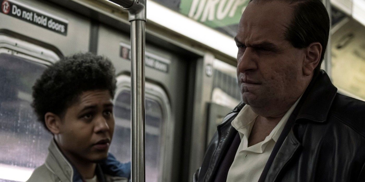 Colin Farrell and Rhenzy Feliz standing on a subway train in The Penguin