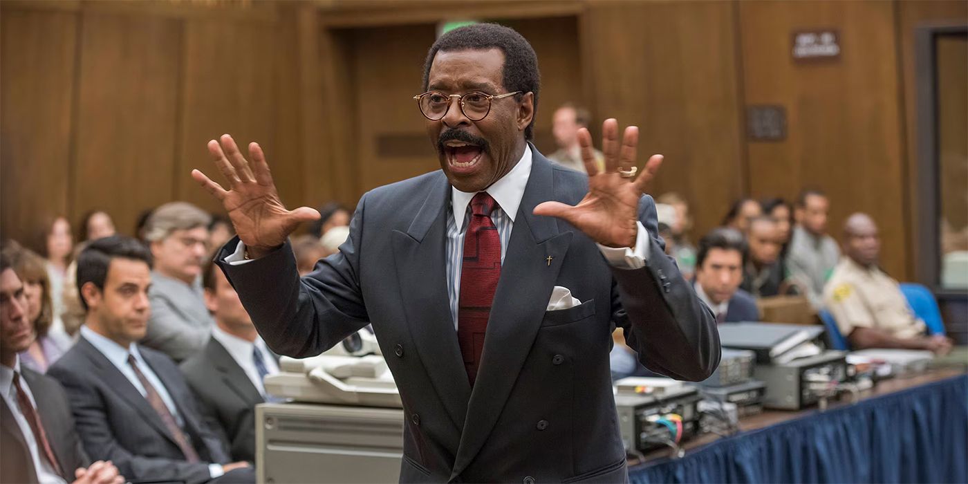 Courtney B. Vance as Johnny Cochran holding his hands up and speaking to the jury