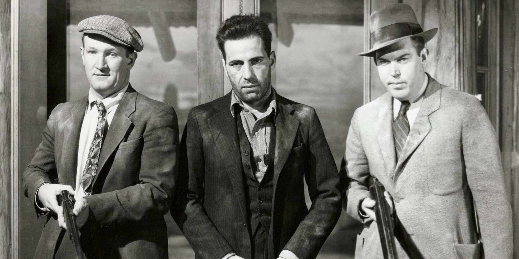 Three men in line looking at the camera in the-petrified-forest