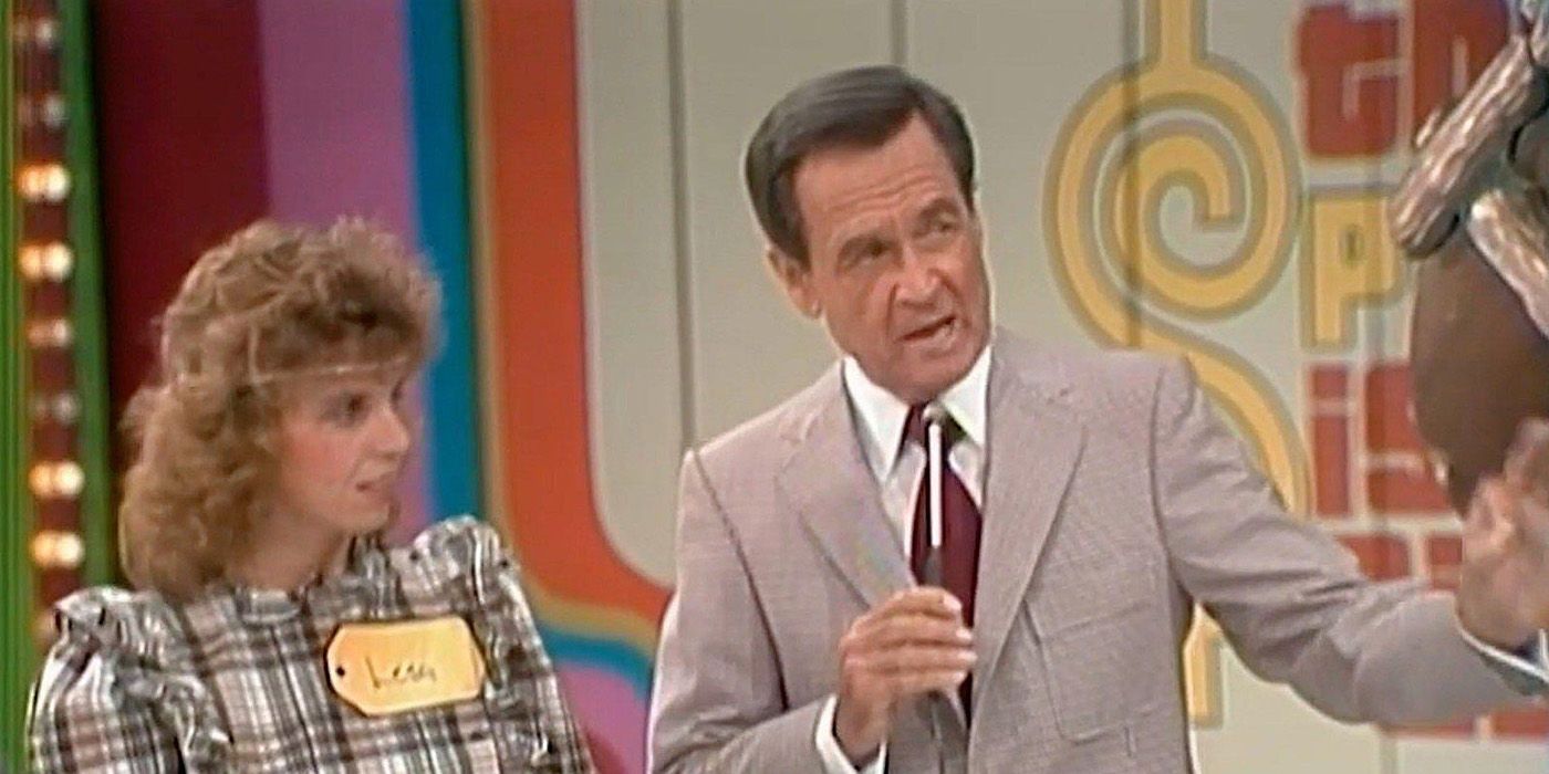 Bob Barker talking to a contestant while gesturing to the game in The Price is Right.