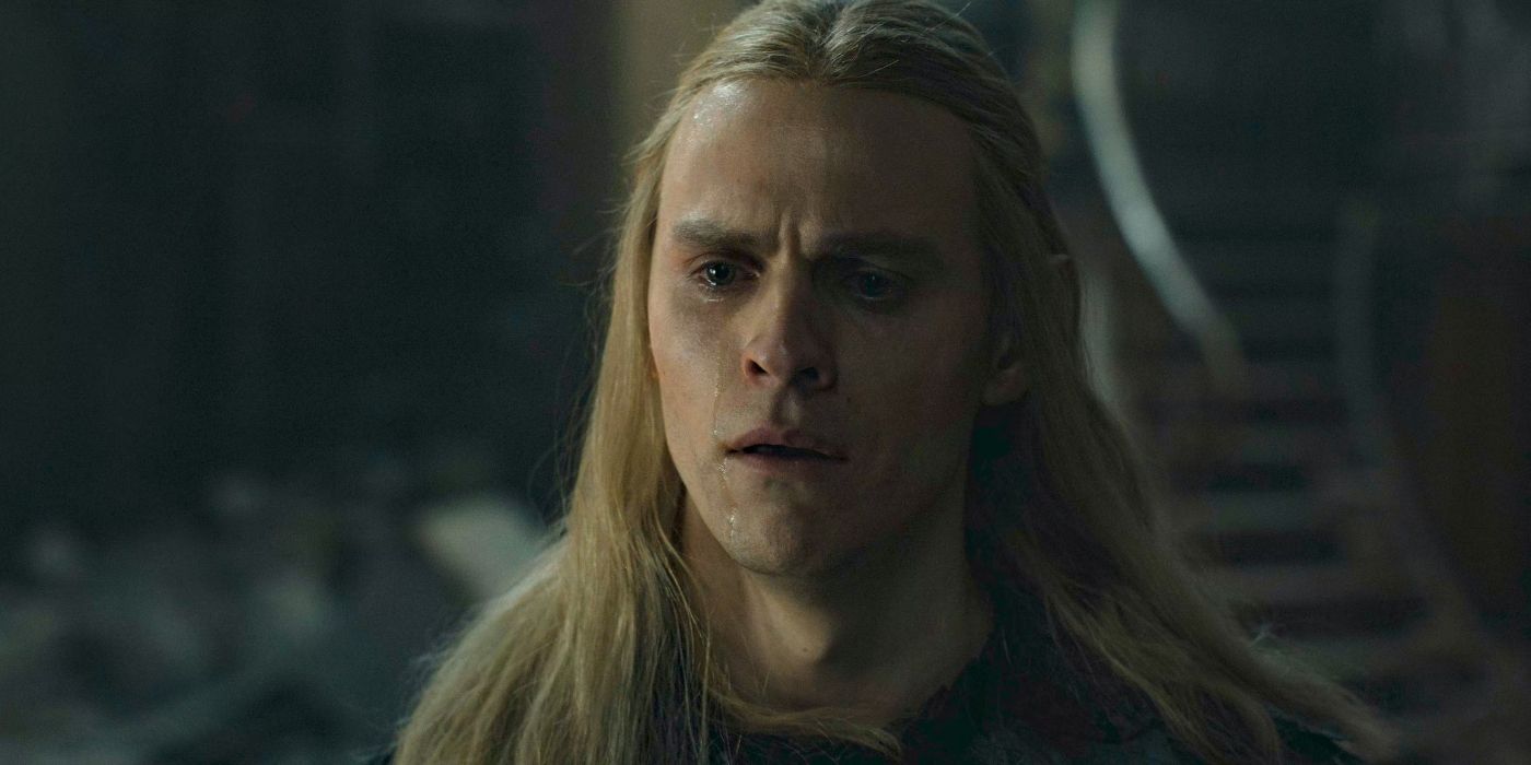 A close up of Sauron (Charlie Vickers) crying a single tear after killing Celebrimbor in The Rings of Power Season 2 finale