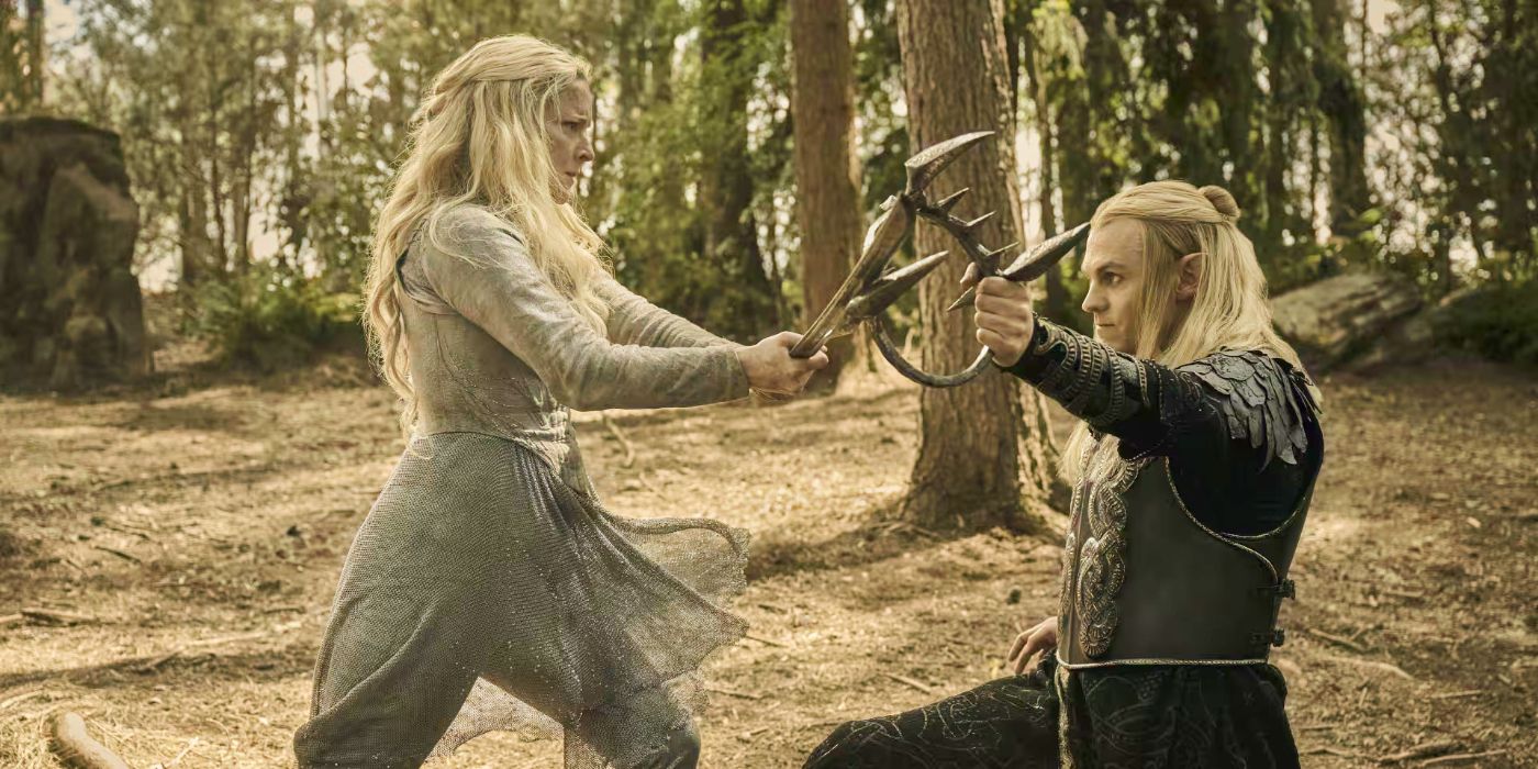 Sauron (Charlie Vickers) kneeling as he blocks Galadriel's (Morfydd Clark) sword with Morgoth's crown in The Rings of Power Season 2 finale