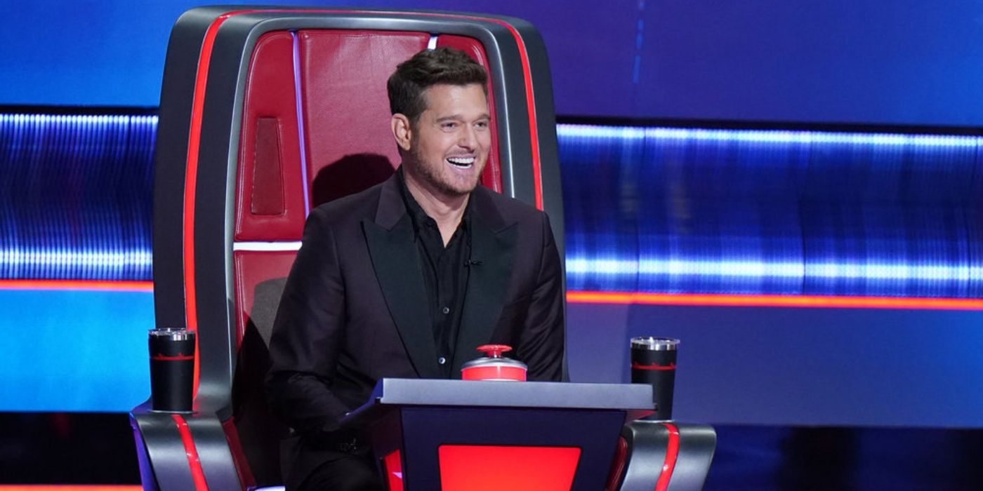 Michael Bublé smiles as he watches the Battle Rounds on 'The Voice' Season 26.