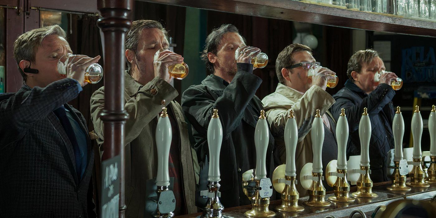 Simong Pegg, Nick Frost, and the rest of the cast drink at a pub in 'The World's End' 