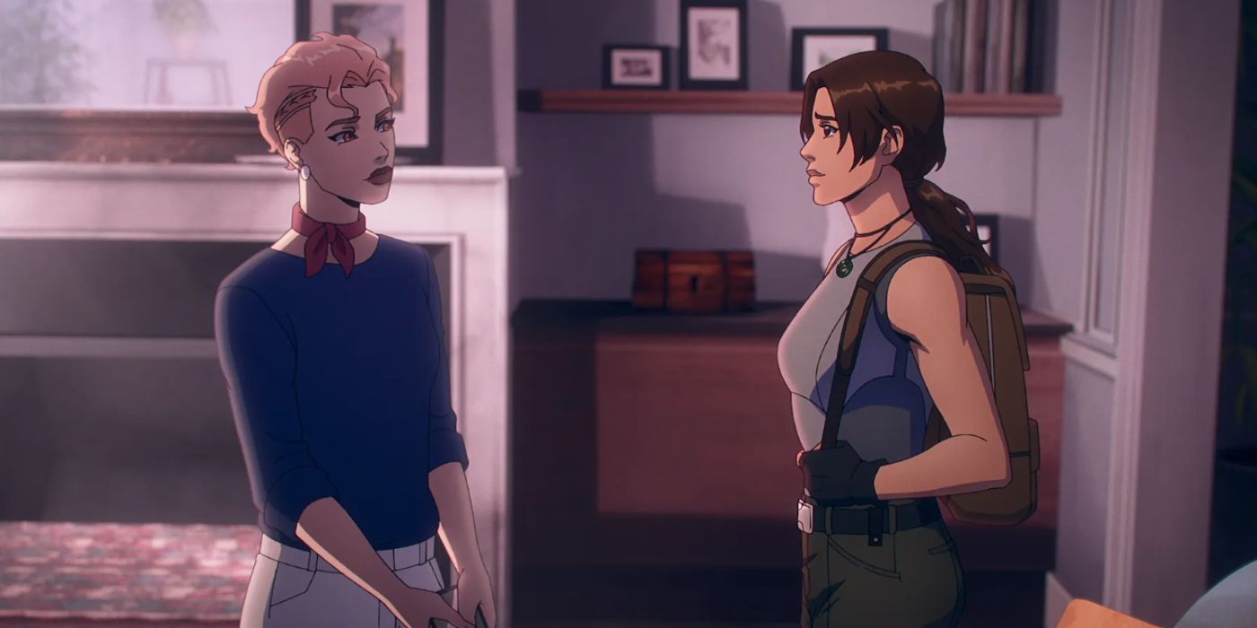 Lara Croft (Hayley Atwell) standing on the right in a living room and talking to woman with short blonde hair in Tomb Raider: The Legend of Lara Croft