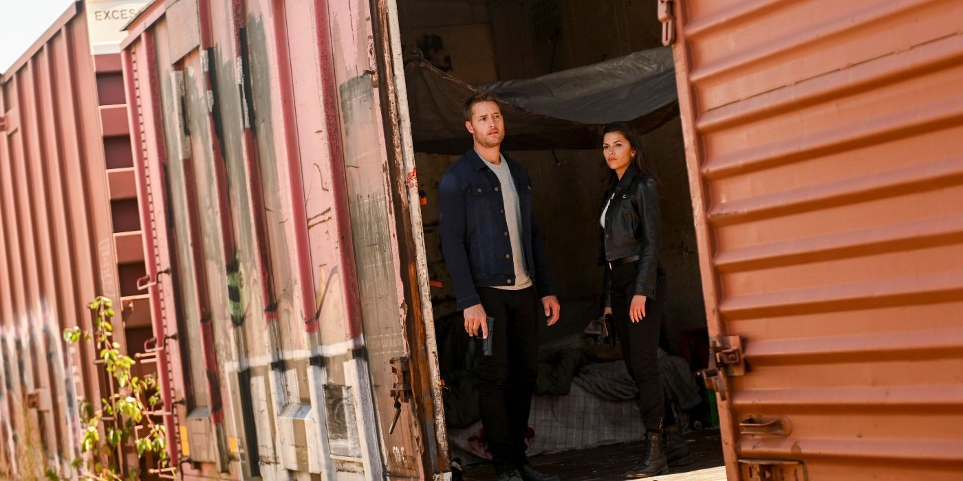 Sofia Pernas and Justin Hartley in a train car