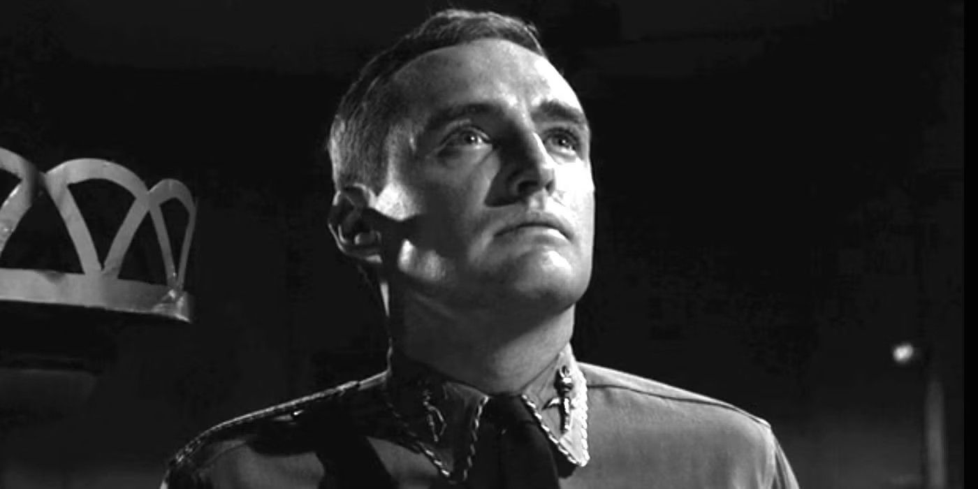 Twilight Zone's Dennis Hopper looks up into the distance proudly
